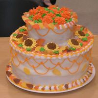Autumn Cake I did this cake a few months ago at Michael's for a class demonstration. The leaves are gumpaste, the flowers are royal icing and the...