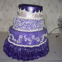 Purple Pleasure I made this cake after watching the Food Network's Wedding Cake Challenge. I loved the skirted cake and I had to make it. The cake was...