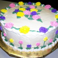 Flowers Everywhere Another nothing to do cake. This one is iced in French Buttercream. Delicious!