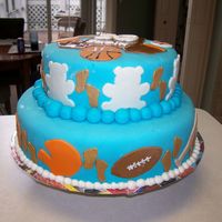 Maliq Shamir My second grandbaby is on his way!! We had a sports themed baby shower. Cake covered in MMF with MMF accents.