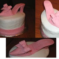 Shoe Cake For Sara This cake is for a friend's birthday. She is shoe crazy. It's an oval cake with buttercream icing. The shoe and "ribbon"...