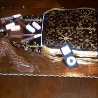 My First Purse Cake. Yeah!! I made this cake for a lady who loves accessories but has trouble keeping it all together! She loved it. Said it matched her personality...