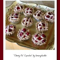 Cherry Pie Cupcakes Cheesecake flavored buttercream w/ cherry pie filling on top of a butter cupcake....