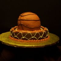 Basketball And Net I made this cake for a friend's son's 15th birthday. The rim is a carved out 10" chocolate cake and the ball was baked in a...