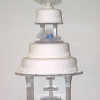 My First Wedding Cake. My very first wedding cake. I used the Dream Cake recipe from this site and I used strawberry filling and FondX fondant as a covering. The...