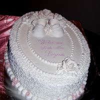 Baby Shower Cake Almond sour cream (from this site) and raspberry buttercream filling. Icing is Sugarshack's recipe. This was my first try at Cornelli...