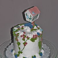 52 Anniversary Cake This is not traditional for an anniversary cake - but my mom loves birdhouses and flowers - so I went with that. All the decorations,...