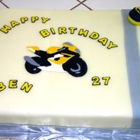 Ben's Cake My daughter and I made this one together. She did the motorcycle out of color flow since her boyfriend ride them and she molded the helmet...