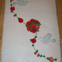 Roses & Doves All done in B/C. Cake is two 12x18's put together to form an 18x24" cake. There isn't a dent in the upper left portion. The...