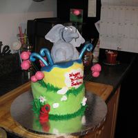 Horton Hears A Who First attempt at topsy turvy cake--should've gone bigger! Horton and clover flowers made of fondant-covered rice krispie treats.