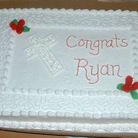 Confirmation Cake Simple white cake with buttercream icing made for a boy at church. Cornelli lace and fondant rosebuds.