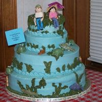 Gone Fishing Red Velvet cake w/ Cream Cheese icing. MMF ppl and choclate fish, turtles and frogs.This cake was done for a lady who said that when she...