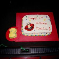 Elmo Cake free hand elmo face and color flow decorations
