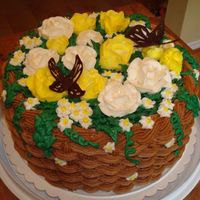 Basket Of Flowers all buttercream with chocolate butterflies.