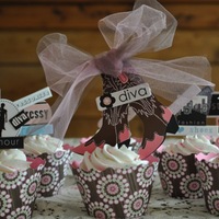 Diva Cupcakes Hand cut cupcake bases and chipboard stickers to create the toppers. The bases are such a simple idea to sprucing up such simple cupcakes...