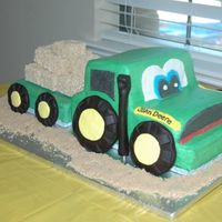 John Deere Birthday Iced in all buttercream, wheels and smoke stack are fondant, hay is rice krispie treats.