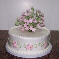 White Cake With Pink Bouquet This cake idea came from the Wilton Tiered Cake book and it is 3 tiers, but I only need a small cake for a friend's bridal shower....
