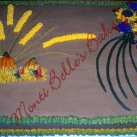 Thanksgiving_Cake_Adjusted.jpg This is a 1/2 sheet made from scratch yellow cake with chocolate buttercream icing. The decorations are buttercream and the flowers are...