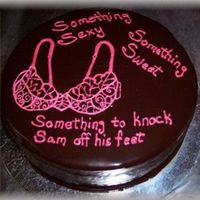 Pink Bra White cake with espresso flavored French Buttercream and covered in Ganache a' Glacer. The decorations matched the invitation that...