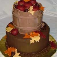 Apple Basket Fondant "basket" cake on top with fondant apples and leaves.