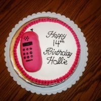 Cell Phone Cake This was a 8in double layer vanilla cake with buttercream icing. The cell phone is made out of rice krispy treats and then covered in...