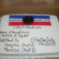 Medicare Cake This was a 1/2 sheet cake. Buttercream icing with red and blue fondant accents. It was for a Surpirse 65th Birthday party!