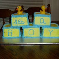 Blue_Ducky_Babyshower_Cake.jpg I used a 4 inch square pan. Each block is a double layer. It took forever, as I only have one of those pans! uugg!!! But the end result was...