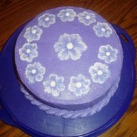 Purple Embroidery Cake This is a double layer 8 in round strawberry cake. Covered with BC icing. This was the first time I have ever done the brush embroidery...
