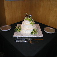 25Th Anniversary Cake Cake I made for my inlaws 25th anniversary. Layers were WASC, Lemon poppy seed and chocolate. Idea from CC.. TFL :)