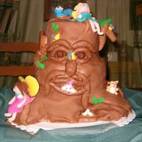 Enchanted Treestump Cake Tree cake for daughter's 5th bday at her treehouse. MMF chocolate fondant covered cake 2/10in, 2/8in and 2/6in carved cakes. Camera--...