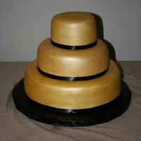 My First Wedding Cake! This cake was for a New Year's Eve Wedding. It gave me some trouble and almost wound up as an all nighter, but I think it came out...