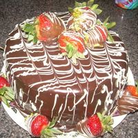 Chocolate Ganache Cake is super duper rich chocolate, the filling is cannoli cream, torted into 5 layers and covered in ganache and chocolate covered...