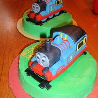 Thomas The Train This was my first attempts at 3D cake making. I used Debbie Browns cake photo as the inspiration. I have twins so I had to make two!
