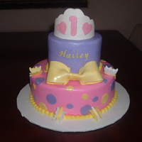 2 Tier 1St Birthday Princess Cake White cake, covered in BC, gumpaste accents, sprayed with luster dust.