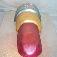 Lipstick Tube Cake Chocolate cake covered in rolled fondant