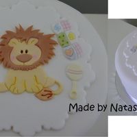 Baby Lion 6 inch fruit cake covered in fondX. Details are made from mexican paste using a patchwork cutter. Thanks for looking!