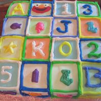 Baby Blocks Birthday A square slab first birthday cake modelled after baby building blocks. Letters refer to baby's initials; numbers are her birthday (5/...