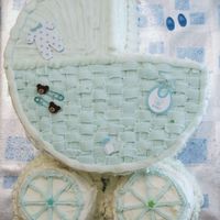 Its A Boy Baby Carriage this is a white cake with strawberries and a cream cheese mixture as the filling. buttercream frosting