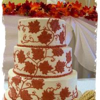Maple Leaf Copper buttercream maple leaves cascading up the cake - one of my fav's!