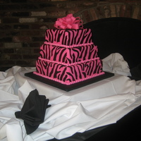Zebra Cake Fondant covered with fondant accents. Used a real zebra pattern to make the cake look more realistic, and not just "striped" like...