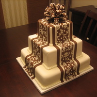 40Th Birthday Cake Idea from one of the Wilton Yearbooks. Covered in fondant. They wanted a three teired cake and only had 40 guests, so the top two tiers are...