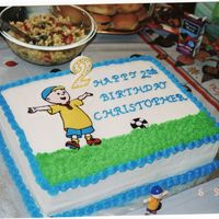 Caillou Cake my son's second birthday cake, all buttercream icing, vanilla cake w/chocolate ganache