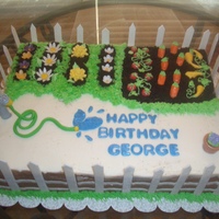 Gardening B'day Vanilla cake with chocolate ganache, covered with chocolate and vanilla buttercream & all fondant accents.