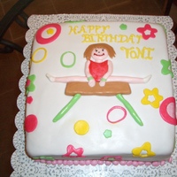 Gymnastics Cake Chocolate cake covered in fondant