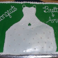 Bridal Shower Cake White and Strawberry cake with green fondant and the wedding dress is fondant.