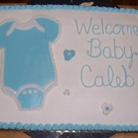Baby Onezie Cake Another onzie cake. Choc & Strawberry cake with bbc icing and the onzie is fondant.
