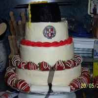 Graduation Cake please excuse the mess in the background!! boy do you decorators make it look so easy! this cake gave me a lot of trouble, the fondant for...