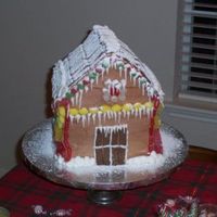 Gingerbread House Even though this looks like a gingerbread house, it's really all cake and chocolate icing.
