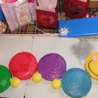 Baby Einstein Caterpillar Cake This was our daughter's 1st birthday cake.She had a Baby Einstein birthday theme.she loved the little caterpillar so we made her a...