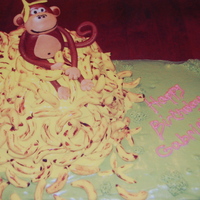 Monkey Business This was so fun to make. banana cake w/cream cheese icing, fondant bananas and monkey. Thanks for looking